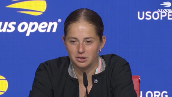 Jelena Ostapenko talks with the media