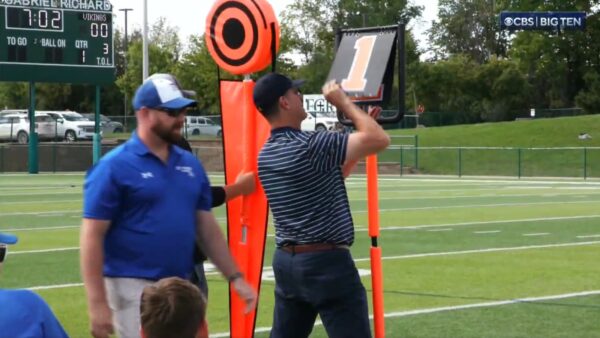 Jim Harbaugh working the chains