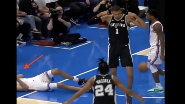 Victor Wembanyama flexing after scoring on Chet Holmgren during Spurs-Thunder game