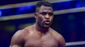 Francis Ngannou looking on