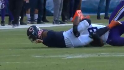 Justin Fields tackled