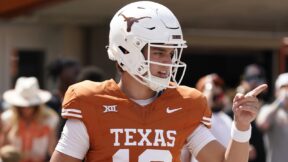 Arch Manning in a Texas helmet