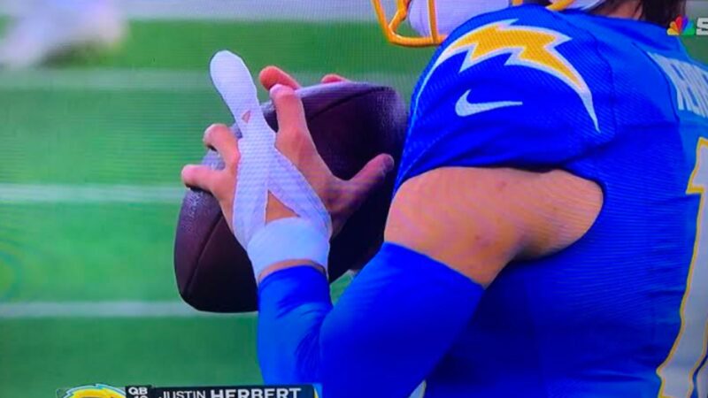 Justin Herbert with a bandaged finger