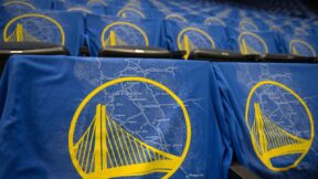 Shirts with the Warriors logo on them