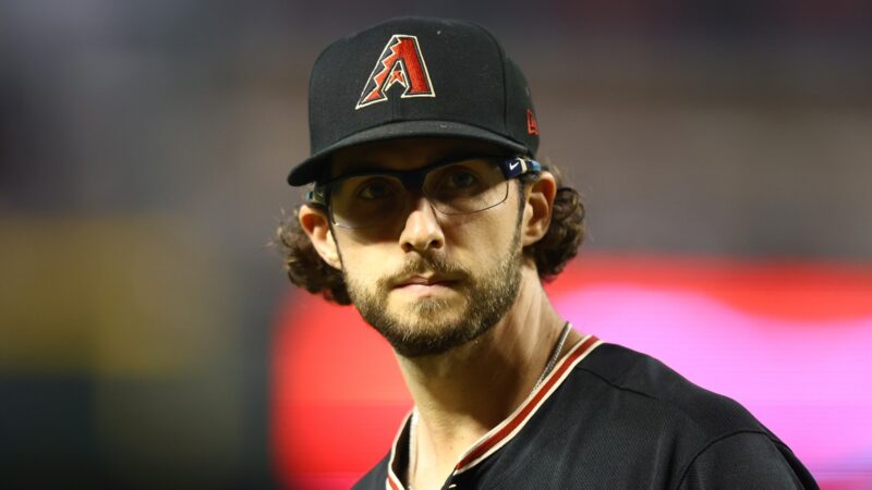 Zac Gallen wearing a Diamondbacks hat