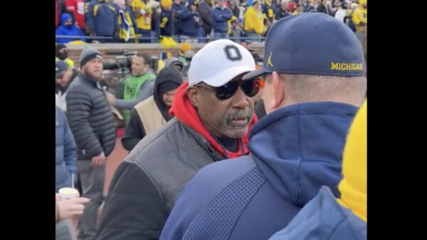 Ohio State athletic director Gene Smith gets heated at Michigan staffer