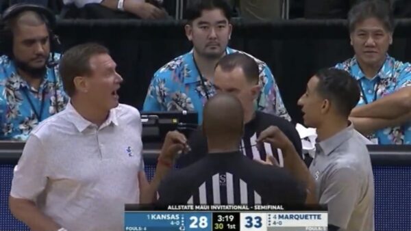 Bill Self and Shaka Smart exchanging words during Marquette-Kansas game
