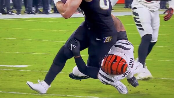 Ravens tight end Mark Andrews getting taken down by a hip-drop tackle