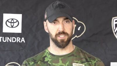 Sean Lewis at a press conference