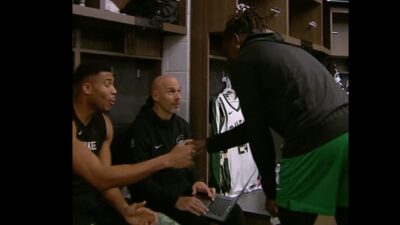 Jrue Holiday and Giannis shake hands