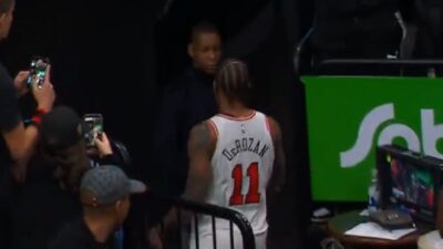 Masai Ujiri embracing DeMar DeRozan