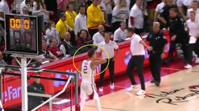 Trevon Brazile walking across the court