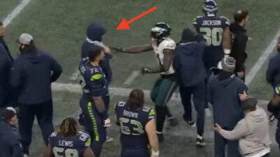 Eagles wide receiver AJ Brown shoving a Seahawks staffer