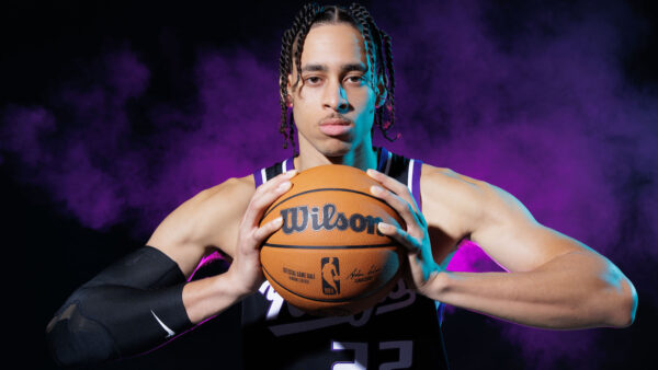 G League player Chance Comanche holding a ball during the Kings' 2023 media day