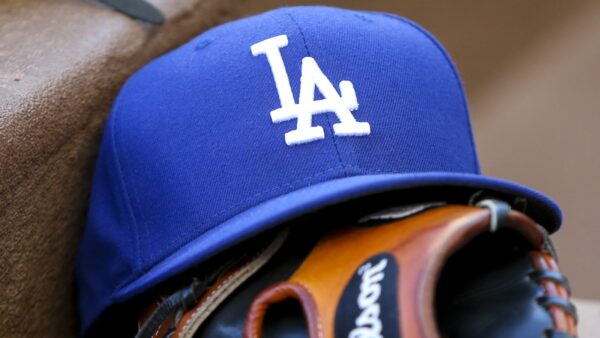 A Dodgers hat in the dugout