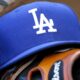 A Dodgers hat in the dugout
