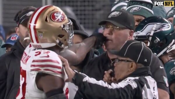 Dre Greenlaw and an Eagles staffer get into it