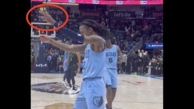 Ja Morant flashing a finger gun celebration during Grizzlies-Pelicans game