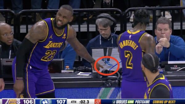 LeBron James pointing to the replay monitor during a Lakers-Timberwolves game