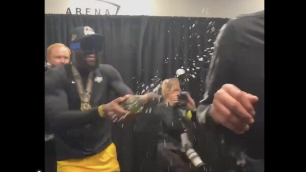 Lakers star LeBron James popping champagne