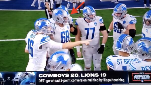 Taylor Decker in the Lions huddle before their two-point conversion attempt against the Cowboys