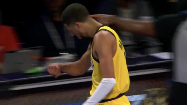 Pacers guard Tyrese Haliburton celebrating by looking at his wrist like Damian Lillard does