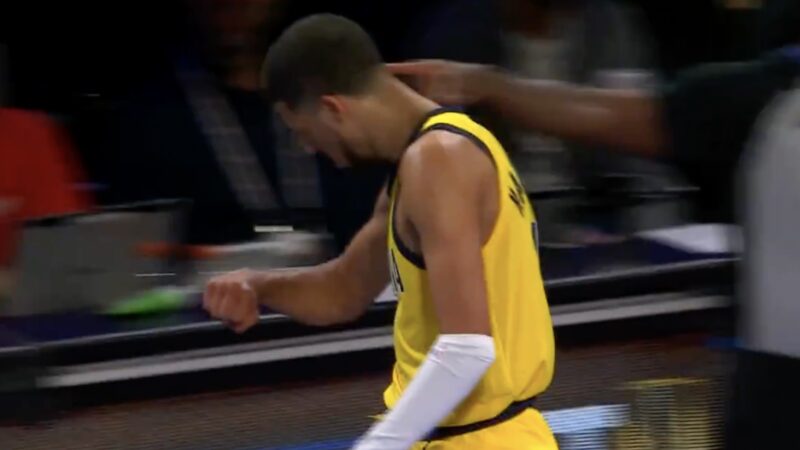 Pacers guard Tyrese Haliburton celebrating by looking at his wrist like Damian Lillard does