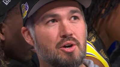 Joey Buss giving an interview