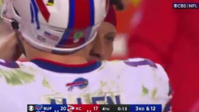 Patrick Mahomes whispering to Josh Allen