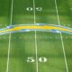 The Los Angeles Chargers' logo at midfield