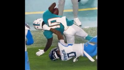 Tyreek Hill brought down by the collar