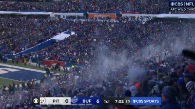Bills fans throw snow into the air