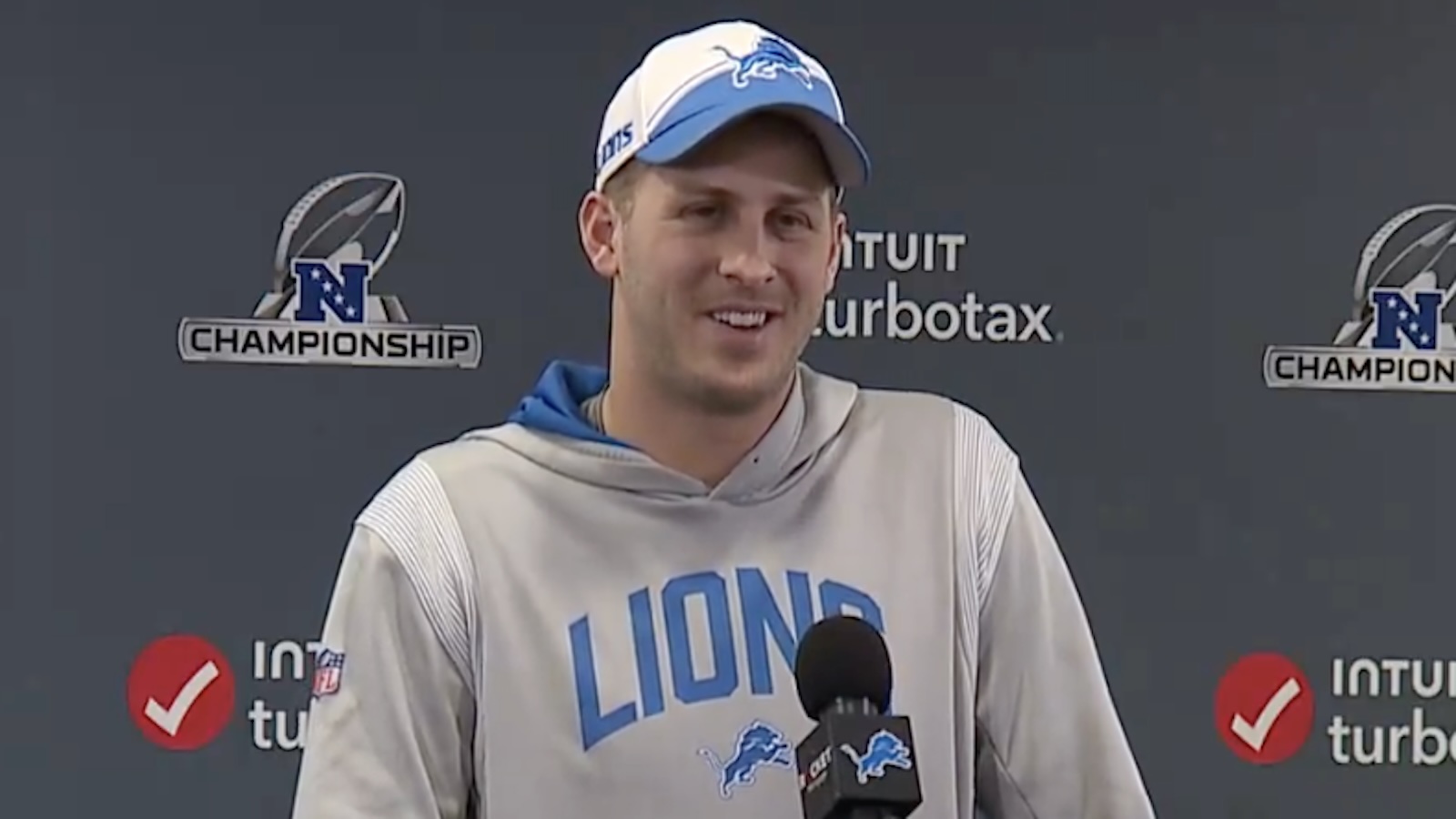 Jared Goff laughs at a press conference