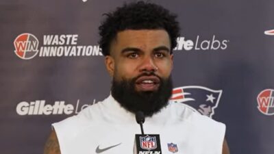 Ezekiel Elliott talks with the media