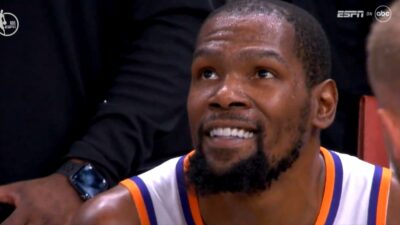 Kevin Durant smiling after Steph Curry's game-winner during Suns-Warriors game