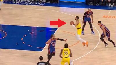 Tyrese Haliburton jumps to make a pass during a Knicks-Pacers game