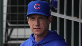 Craig Counsell in a Cubs hat