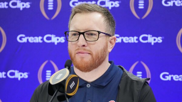 Jay Harbaugh at a press conference