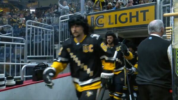 Penguins players in mullets