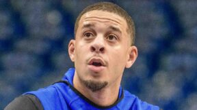 Seth Curry looking on