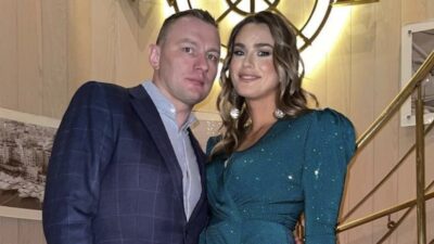 Konstantin Koltsov and Aryna Sabalenka pose for a photo