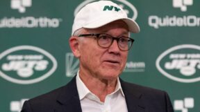 Woody Johnson at a press conference