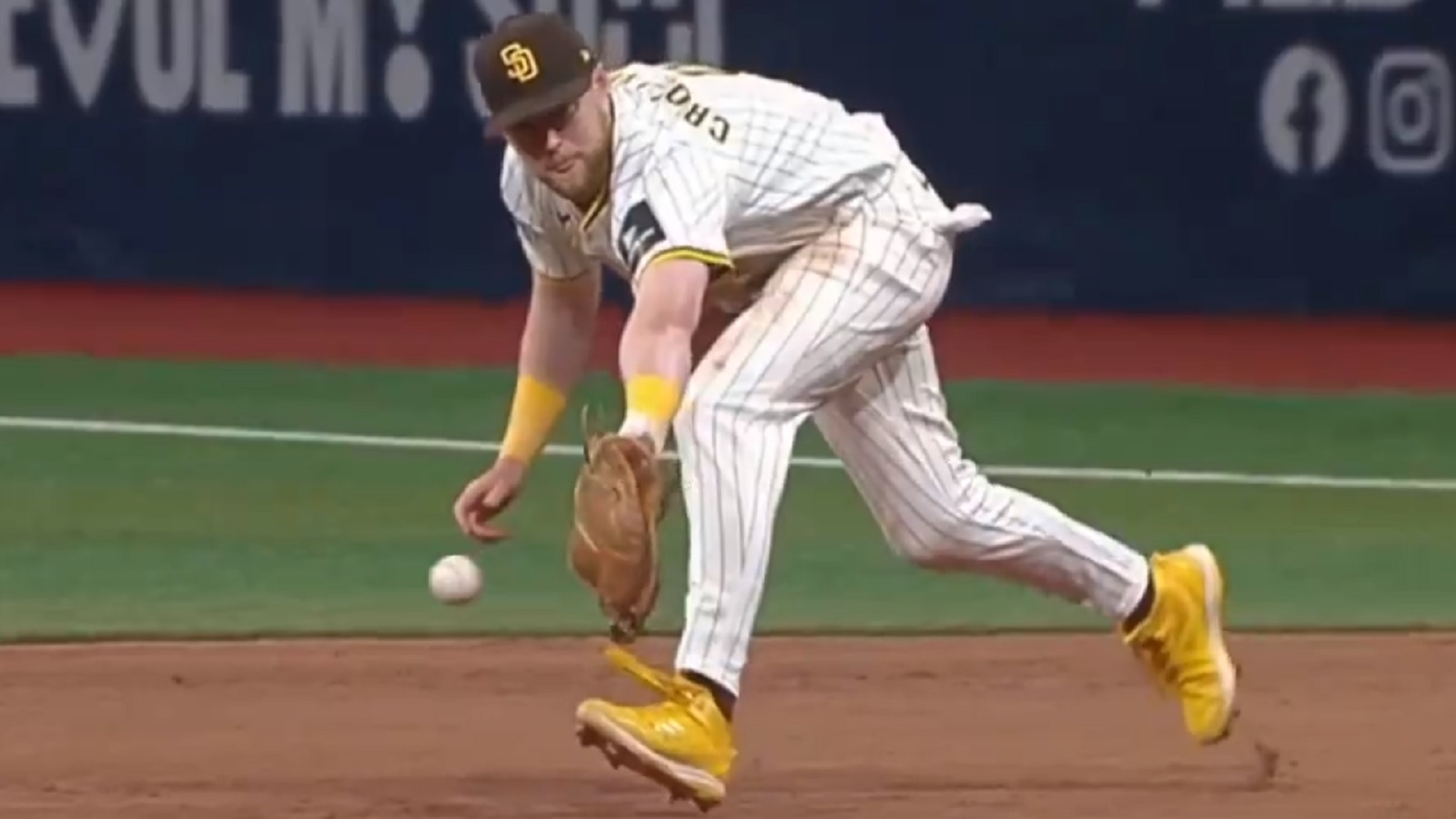 Jake Cronenworth fielding a ball