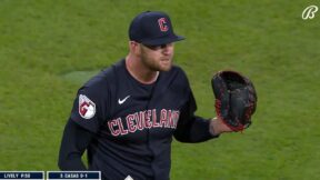 Ben Lively holds up his glove