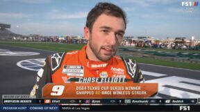 Chase Elliott in his Hooters track suit