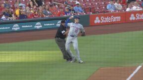 Mets' Brett Baty crashes into third base umpire