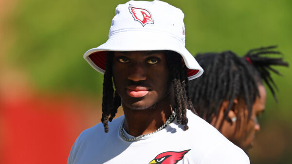 Marvin Harrison Jr. wearing a Cardinals bucket hat