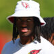 Marvin Harrison Jr. wearing a Cardinals bucket hat