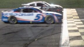 NASCAR Cup Series finish between Kyle Larson and Chris Buescher during AdventHealth 400 at Kansas Speedway