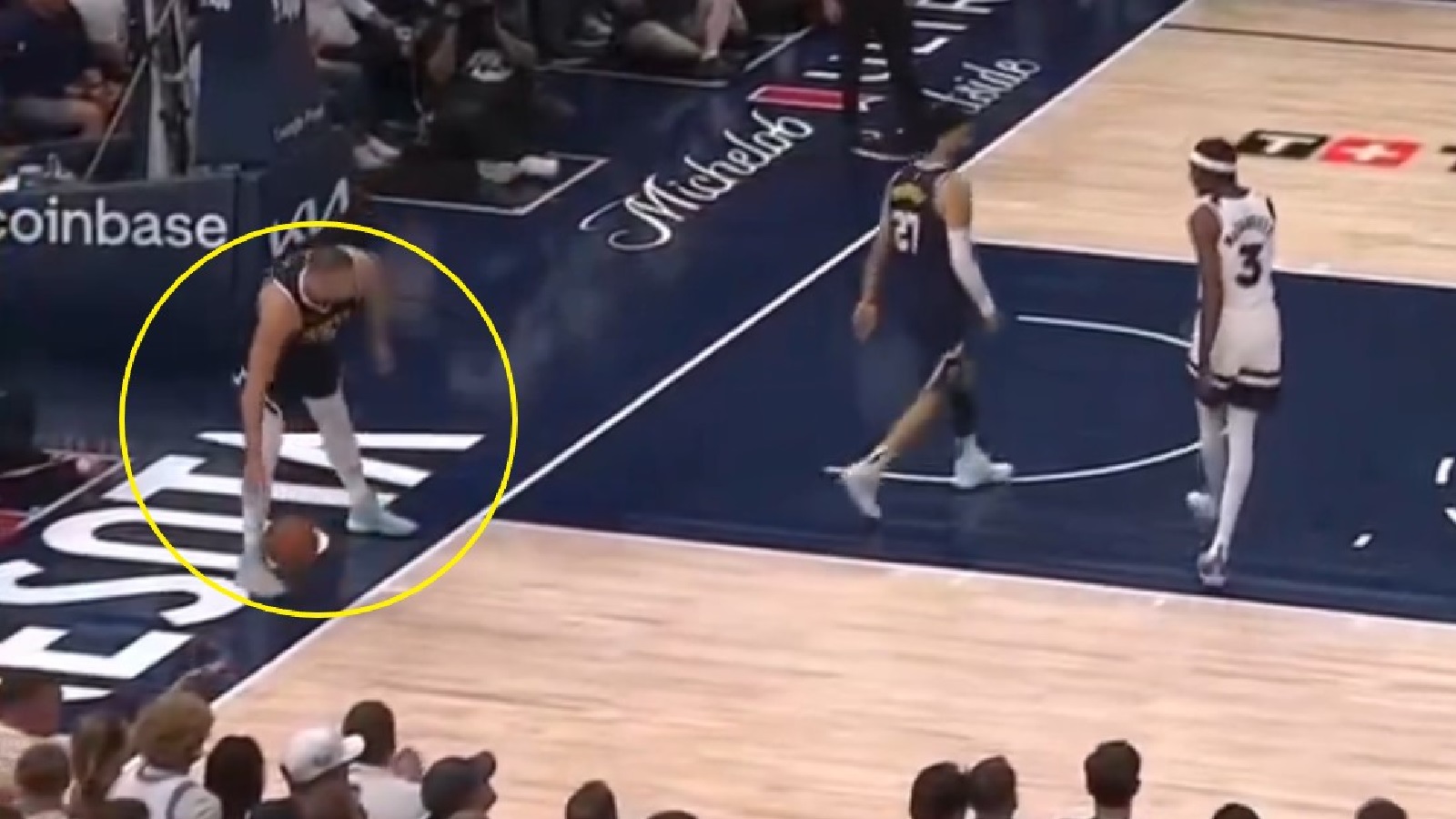 Nikola Jokic letting the ball bounce